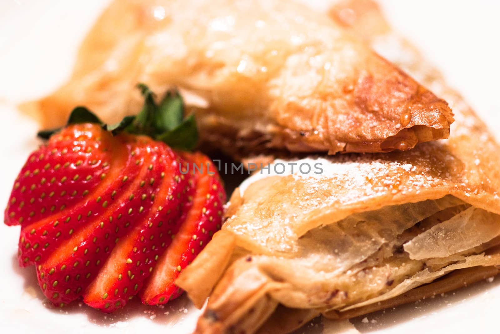 Filled Apple Pastries with Strawberries and Sugar