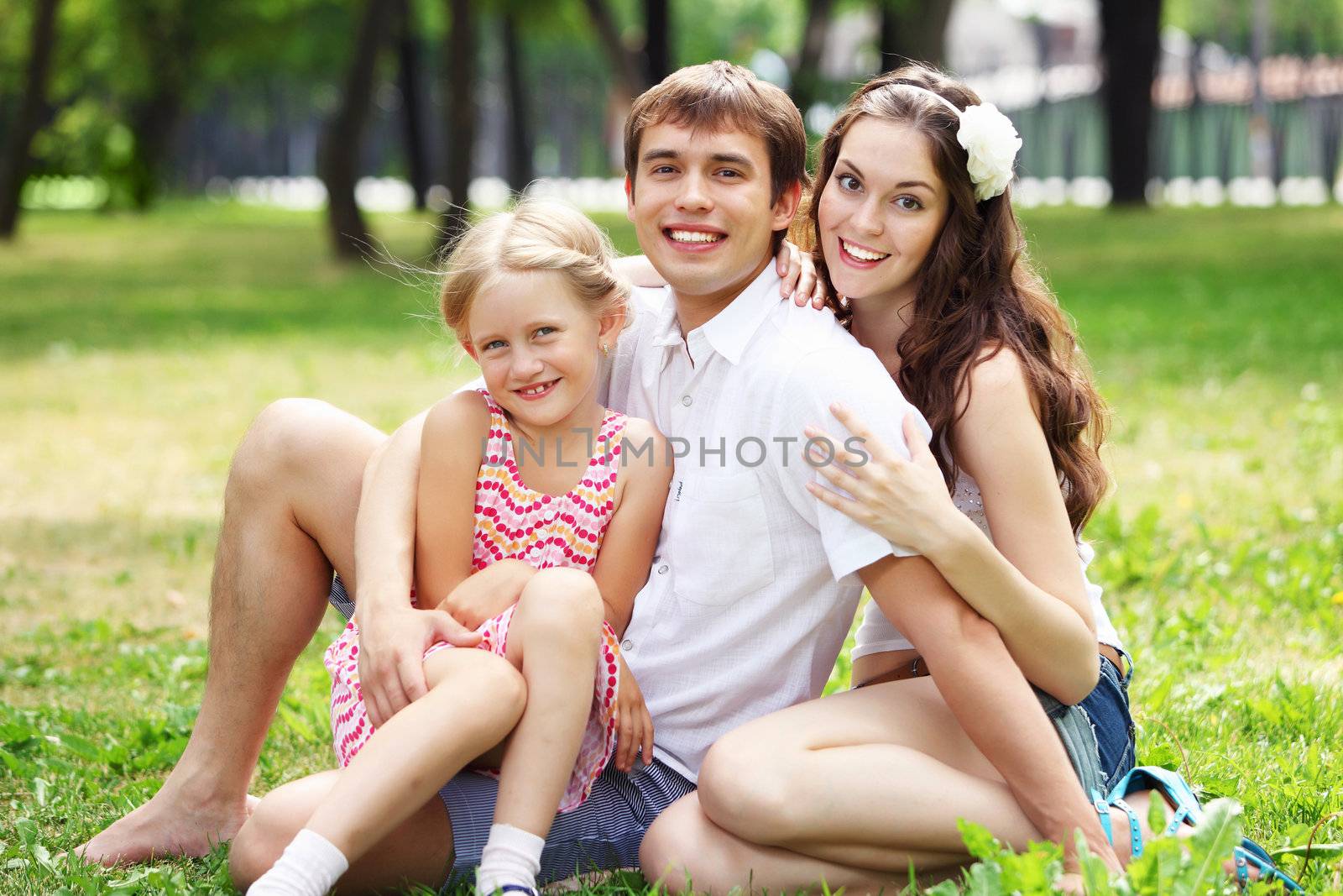 happy family having fun outdoors by sergey_nivens
