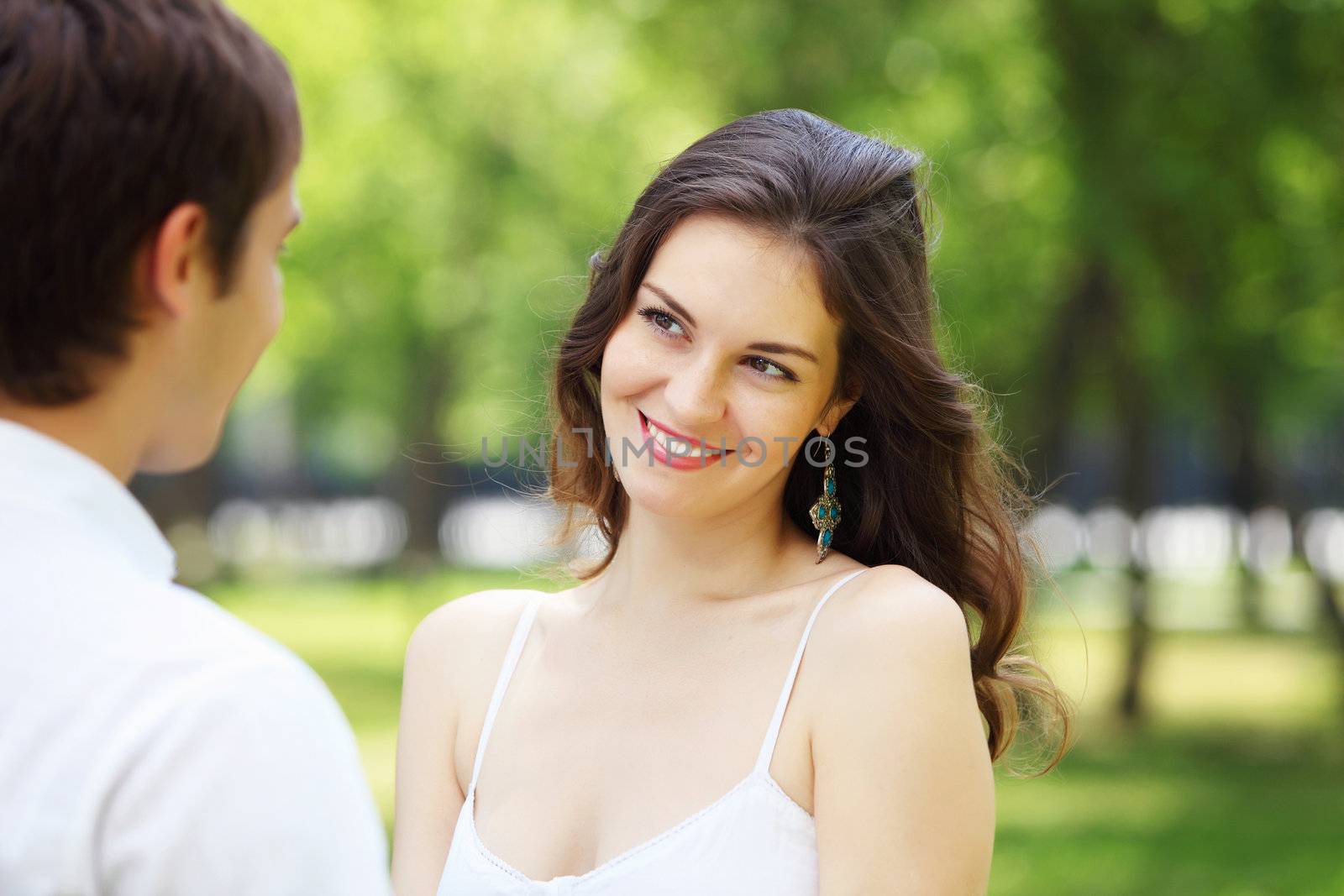 Young love Couple smiling under blue sky by sergey_nivens