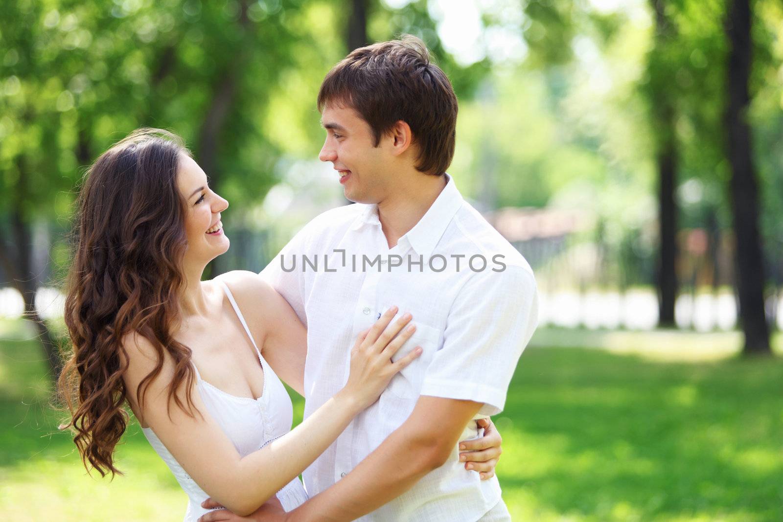 Portrait of a young romantic couple embracing each other
