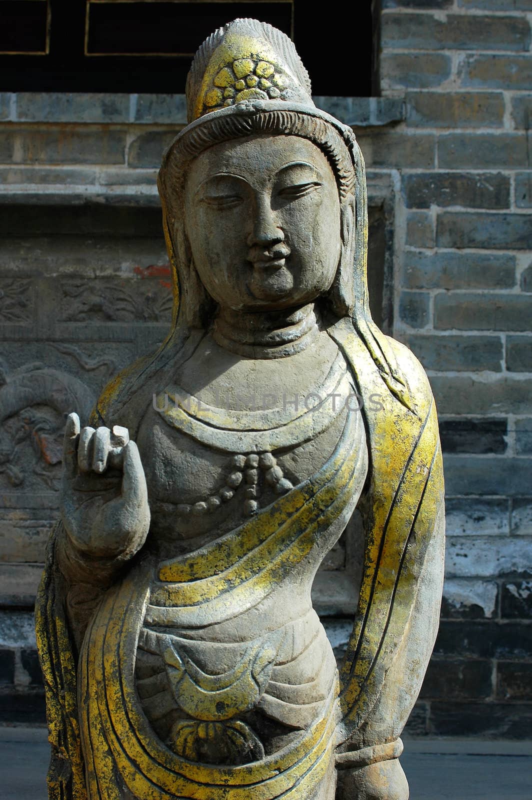 Ancient stone sculpture art of a Buddha