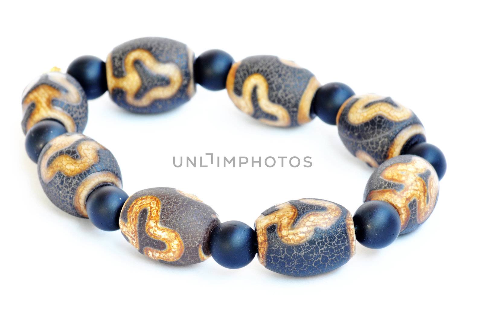 Wooden prayer beads on a white background
