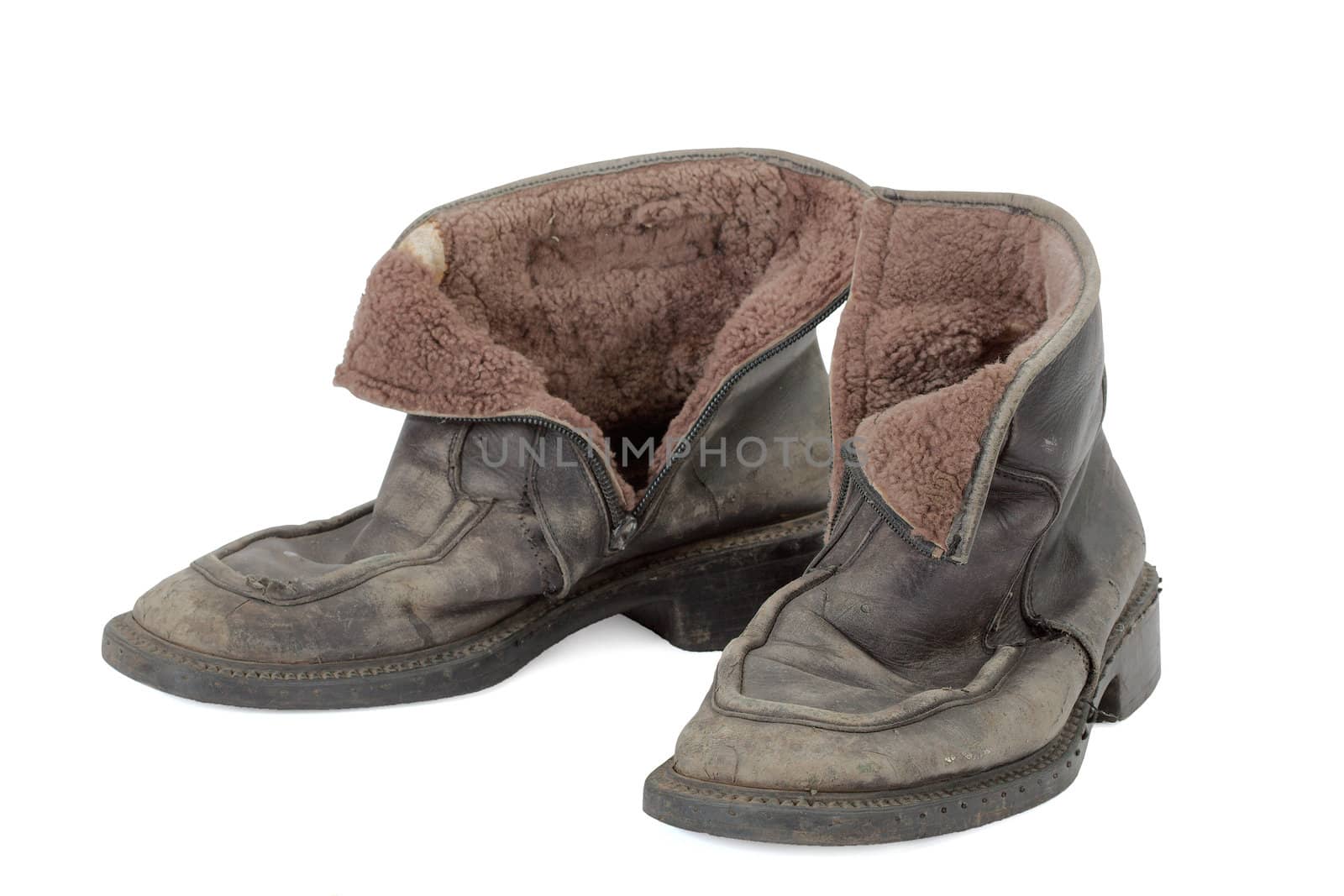 Old boots, isolated on white background