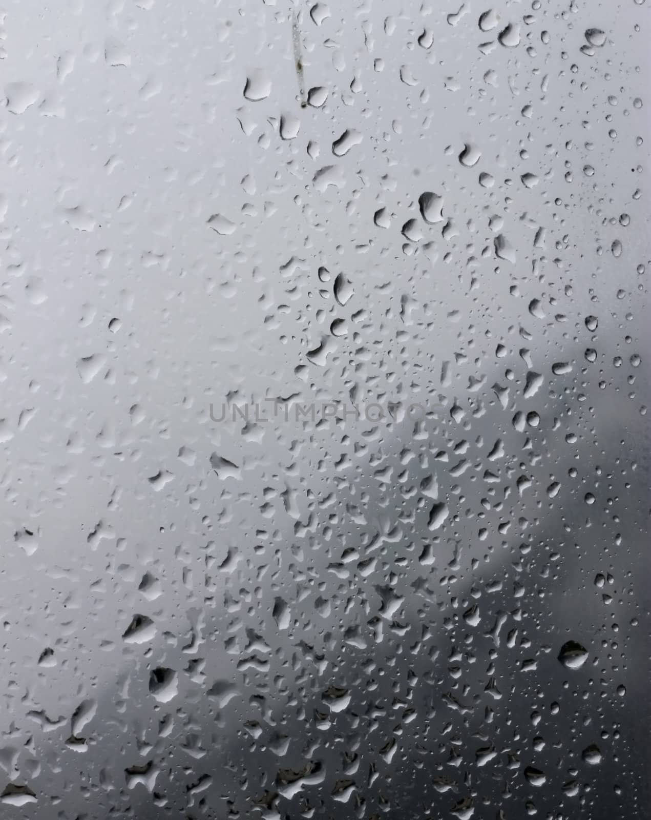 Water drops on window glass after rain