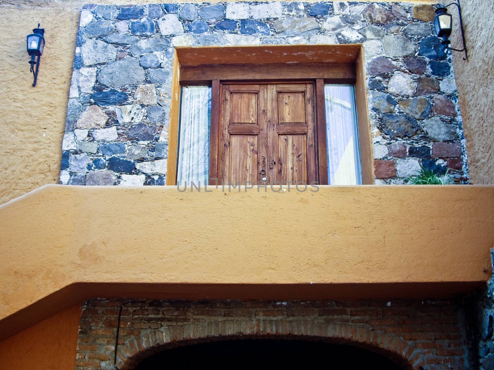 Old style building above a tunnel in Mexico by emattil