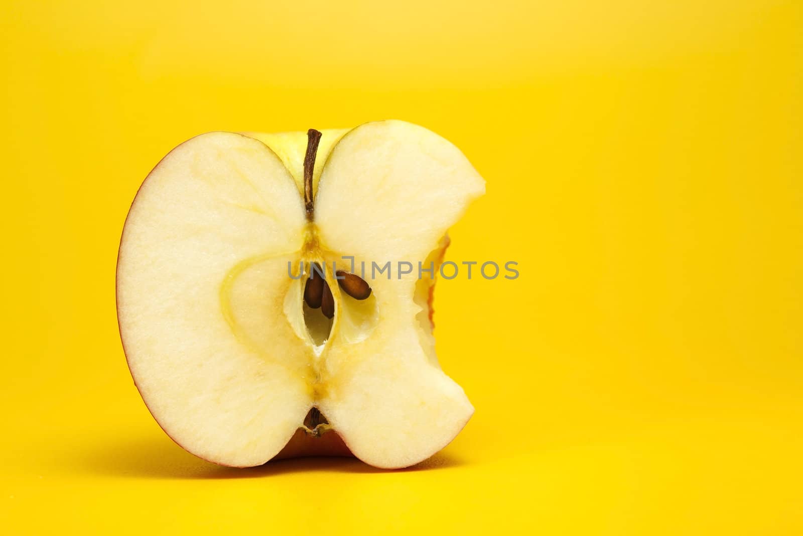 Red apple cut in half