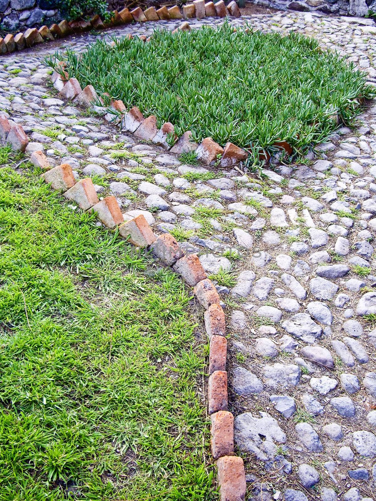 Stone Pathway with green grass by emattil