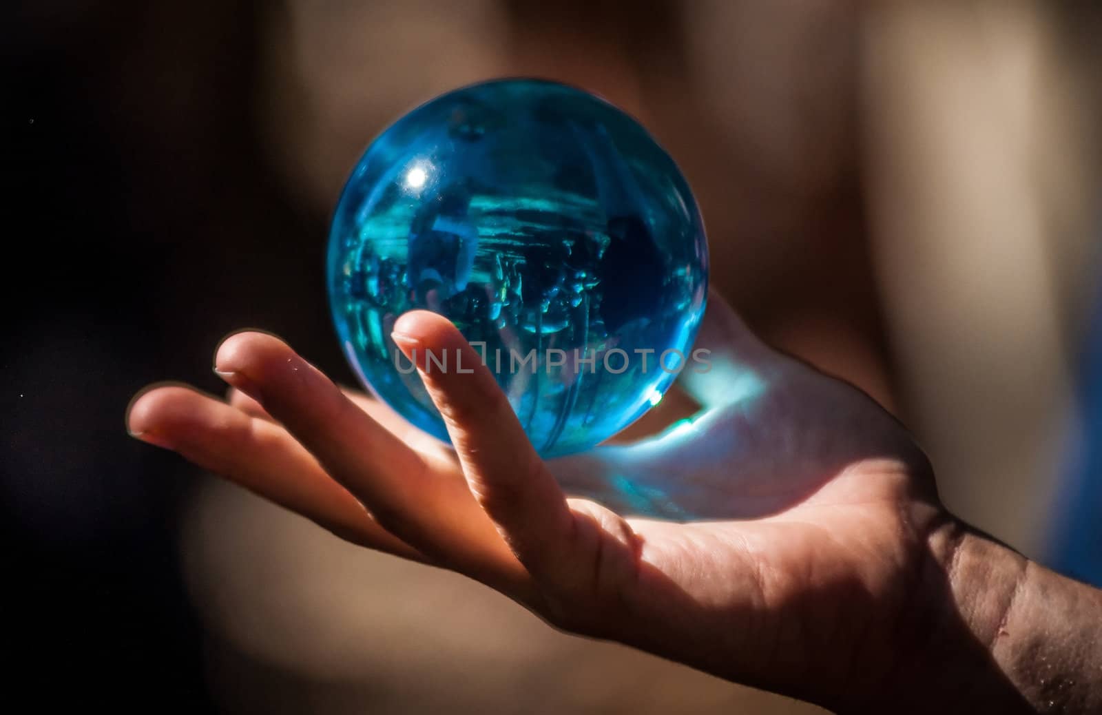 glass ball in hand by digidreamgrafix
