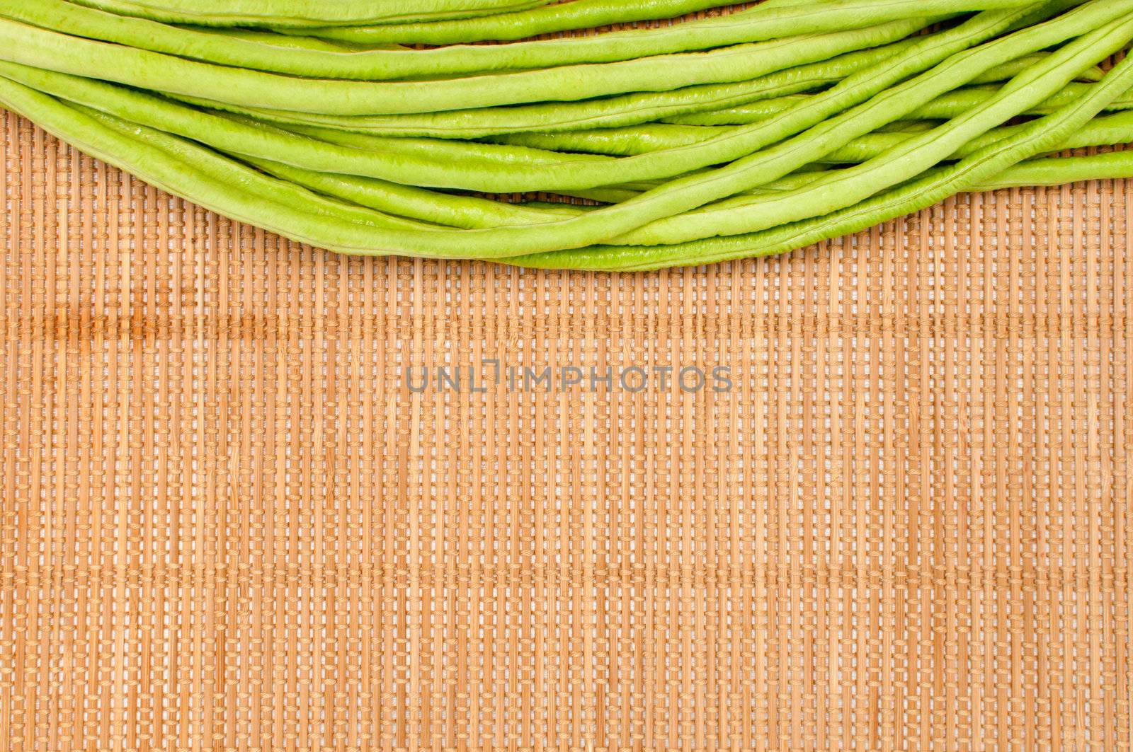 abstract design background vegetables on a bamboo mat background