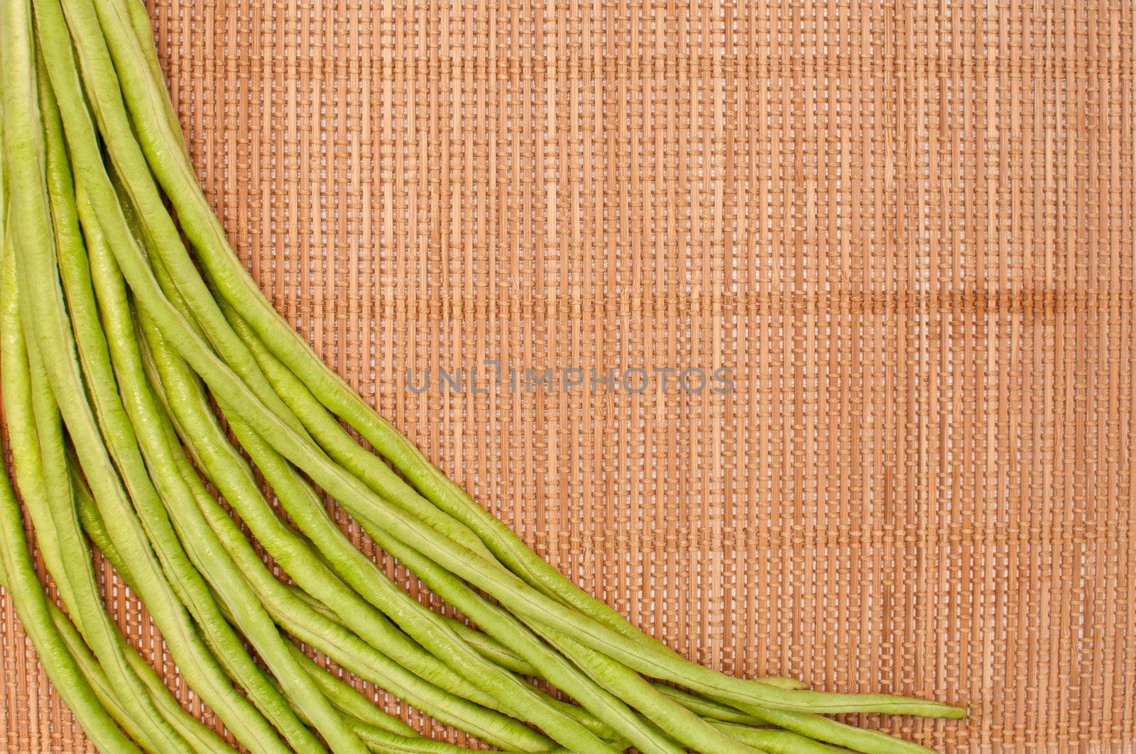 abstract design background vegetables on a bamboo mat background