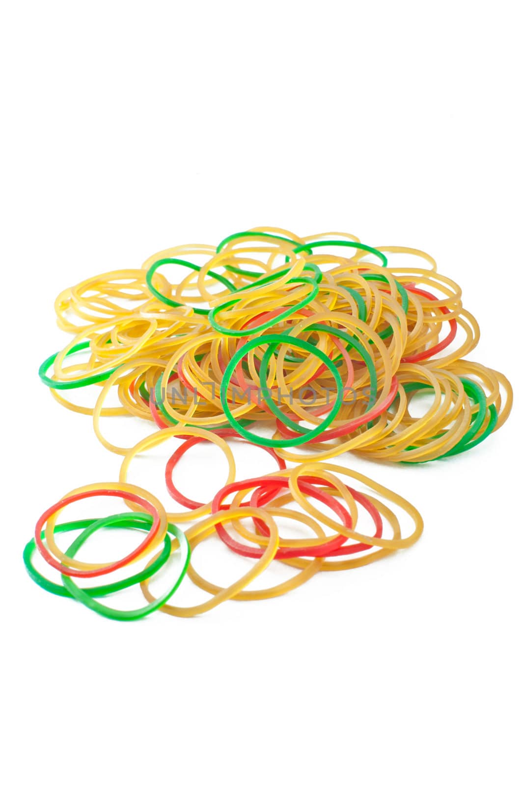 Colorful rubber bands on white background