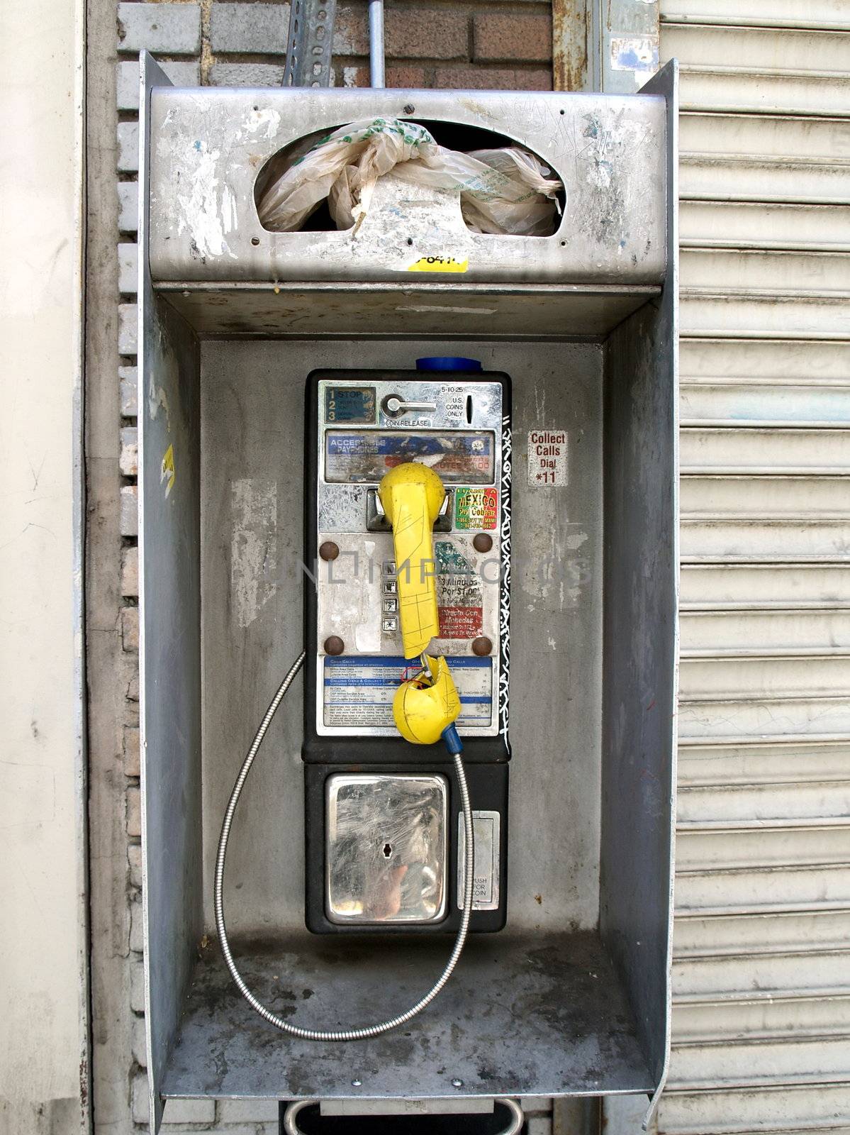 Dirty broken public phone by anderm