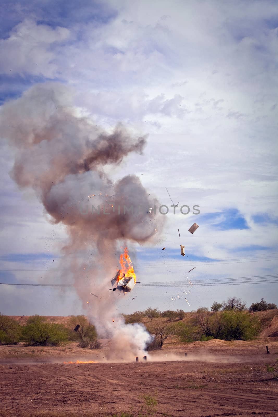 Movie special effects exploding appliance in a desert