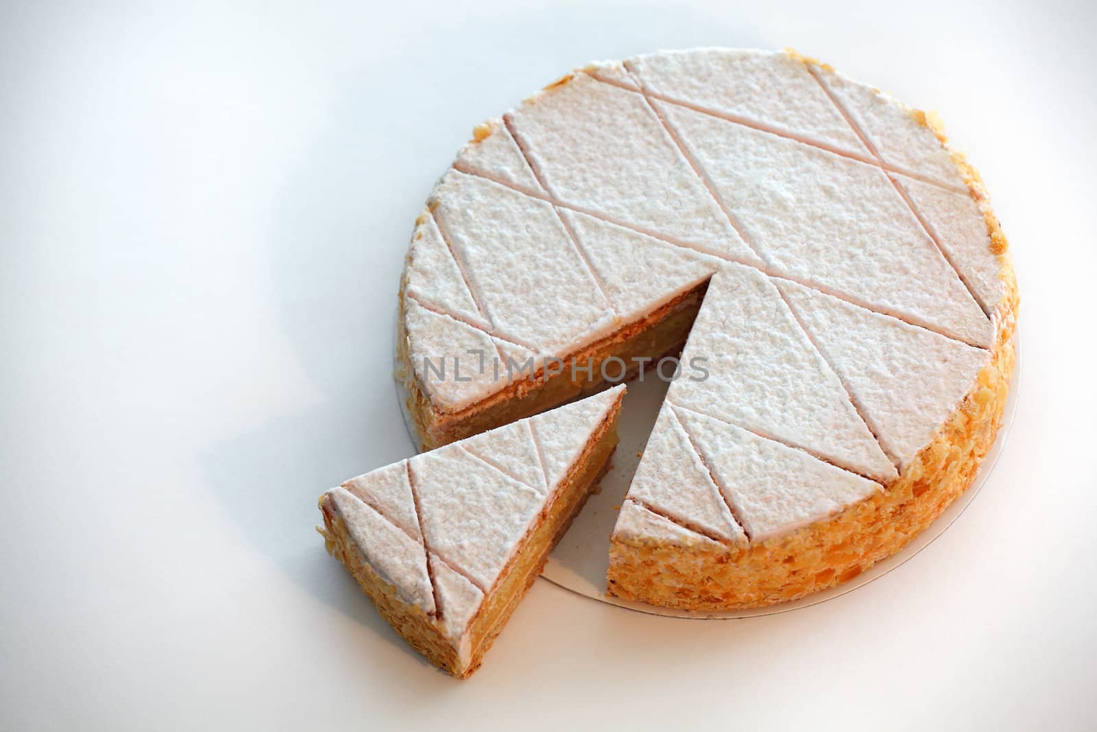 Photo of a traditional Zuger Kirschtorte, or cake made with Kirsch.
