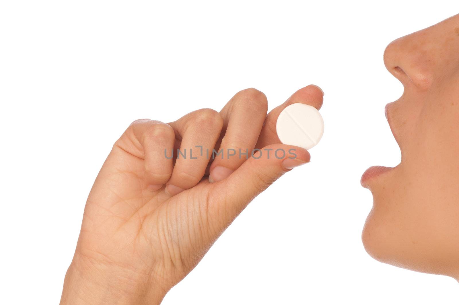 woman taking narcotic in a shape of white pill