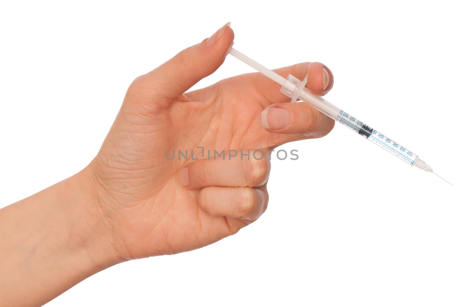 syringe in the woman's hand for making insulin injections