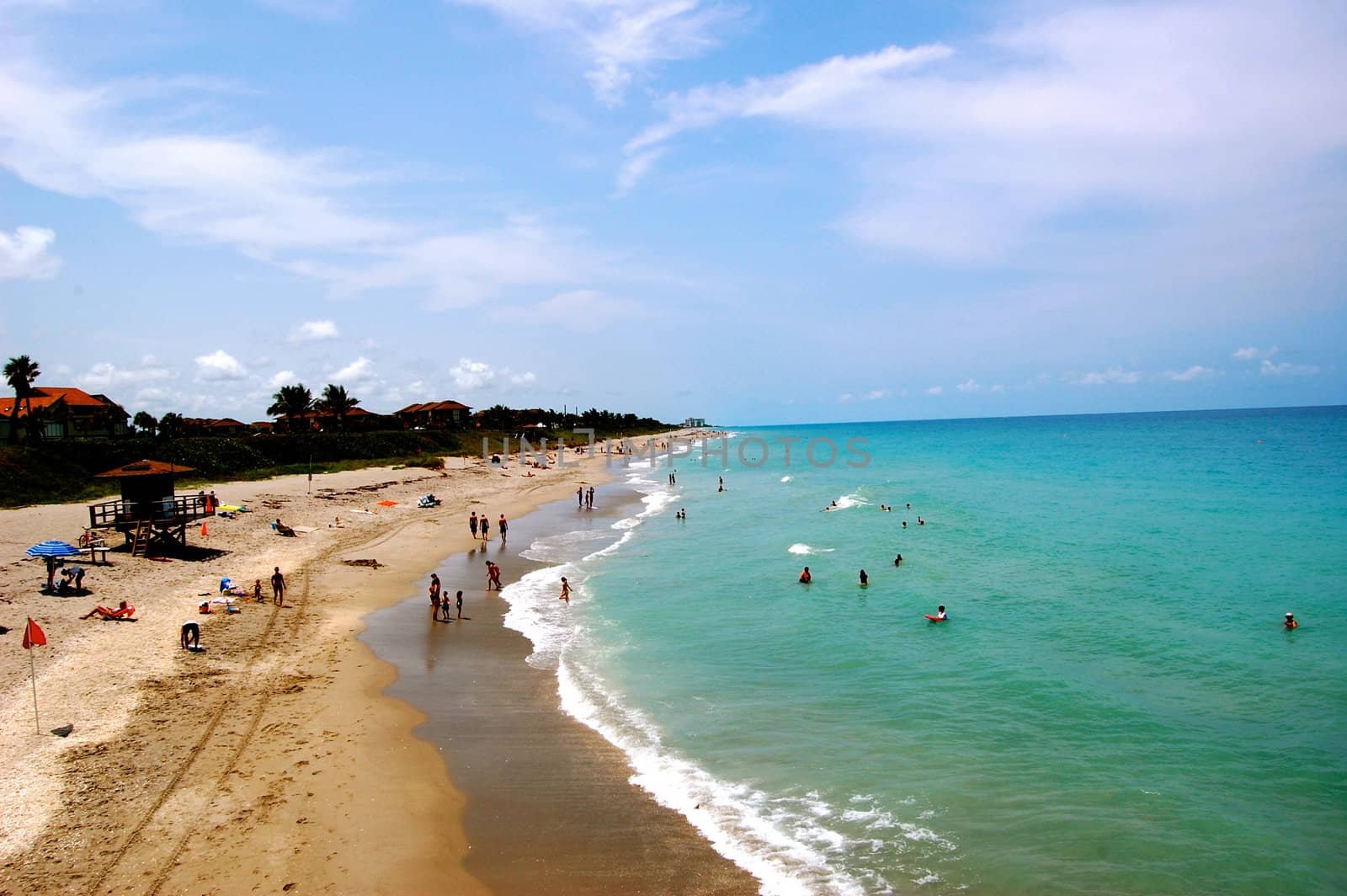 Jupiter Florida People on beach by RefocusPhoto