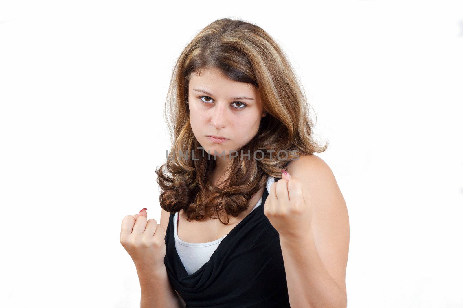brunette business woman on white background getting into a fight 