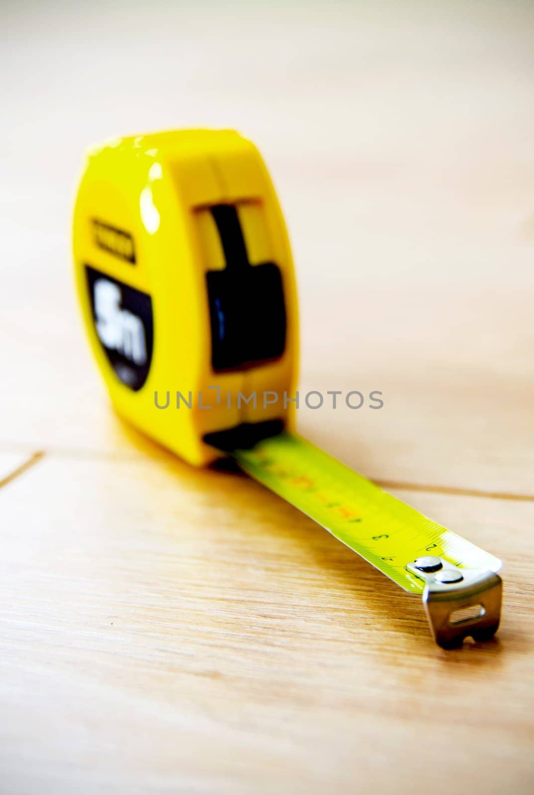 Measure. Tool on wooden floor