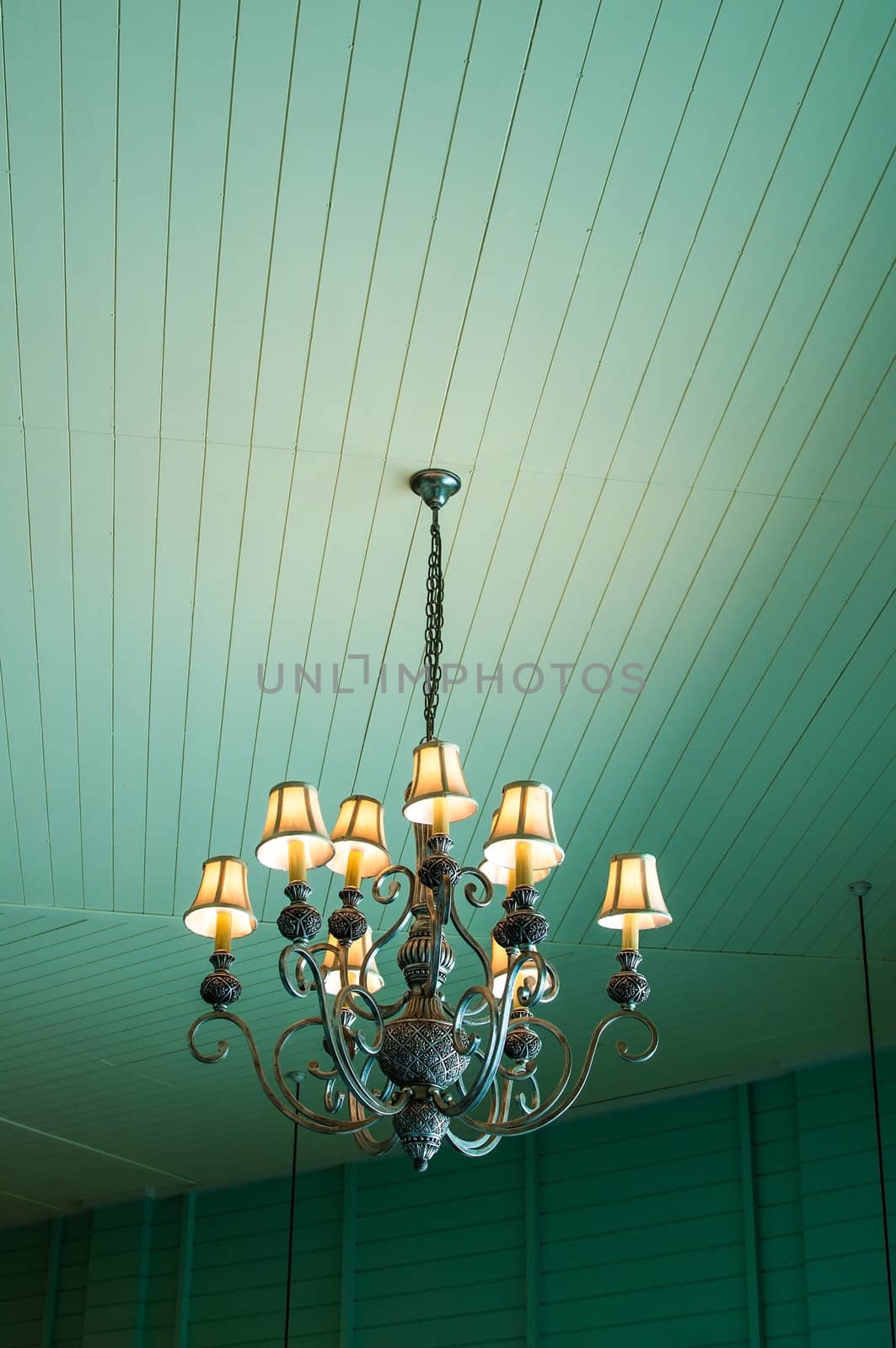 vintage chandelier in pastel blue color vintage wood wall room