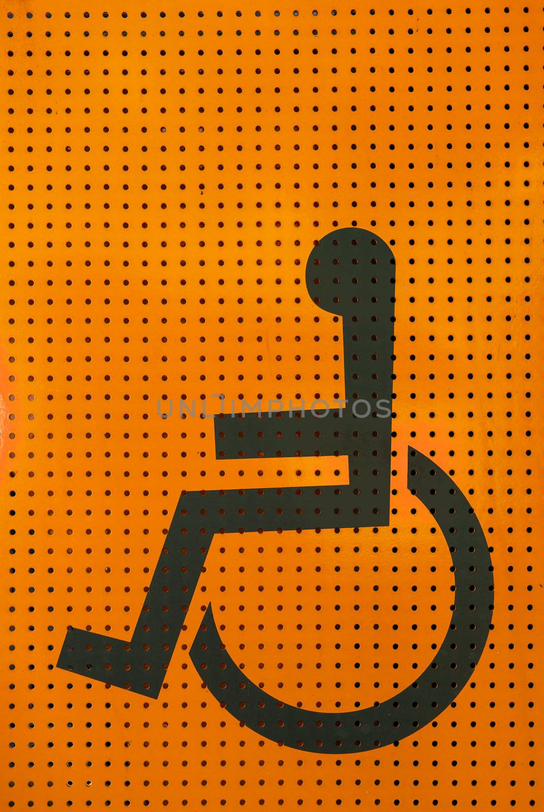 sign disabled icon on orange grating metal