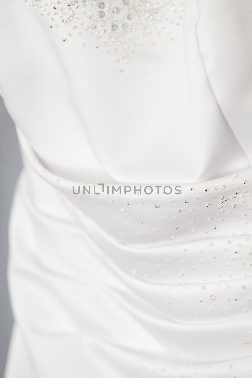 Back detail of a gorgeous white wedding dress.