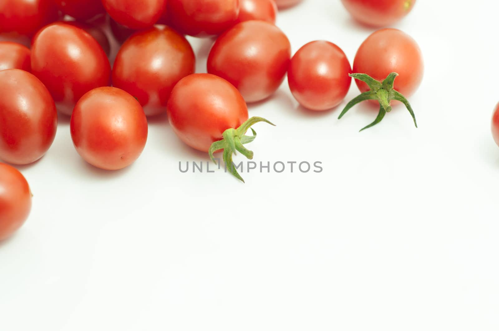 Fresh tomato background by TanawatPontchour