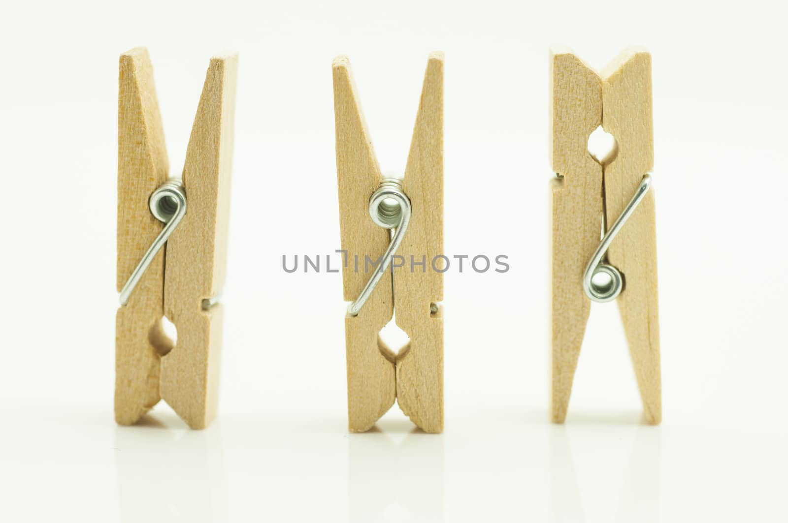 wooden clothes pin on white background