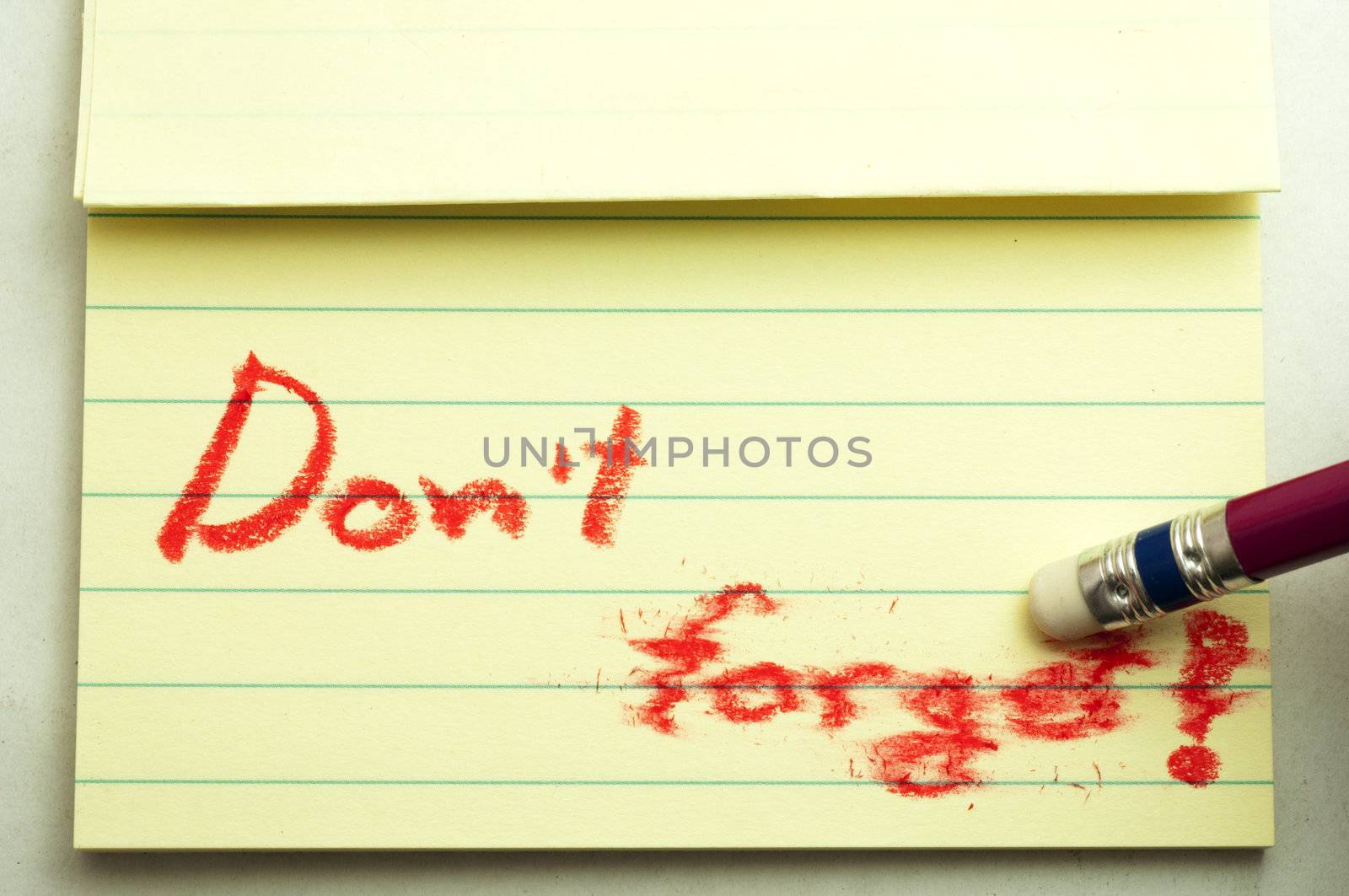 Erasing don't forget note. conceptual