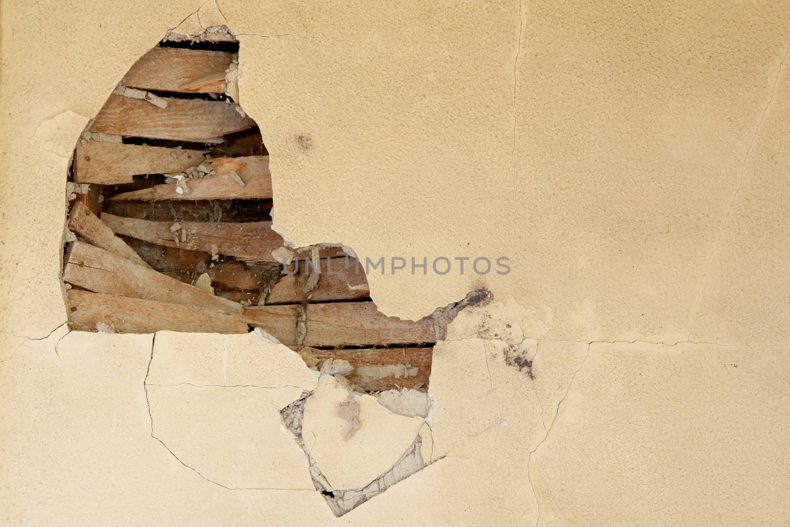 Details of a wall in very bad shape including discoloration and markings, great textured background images with copy space.