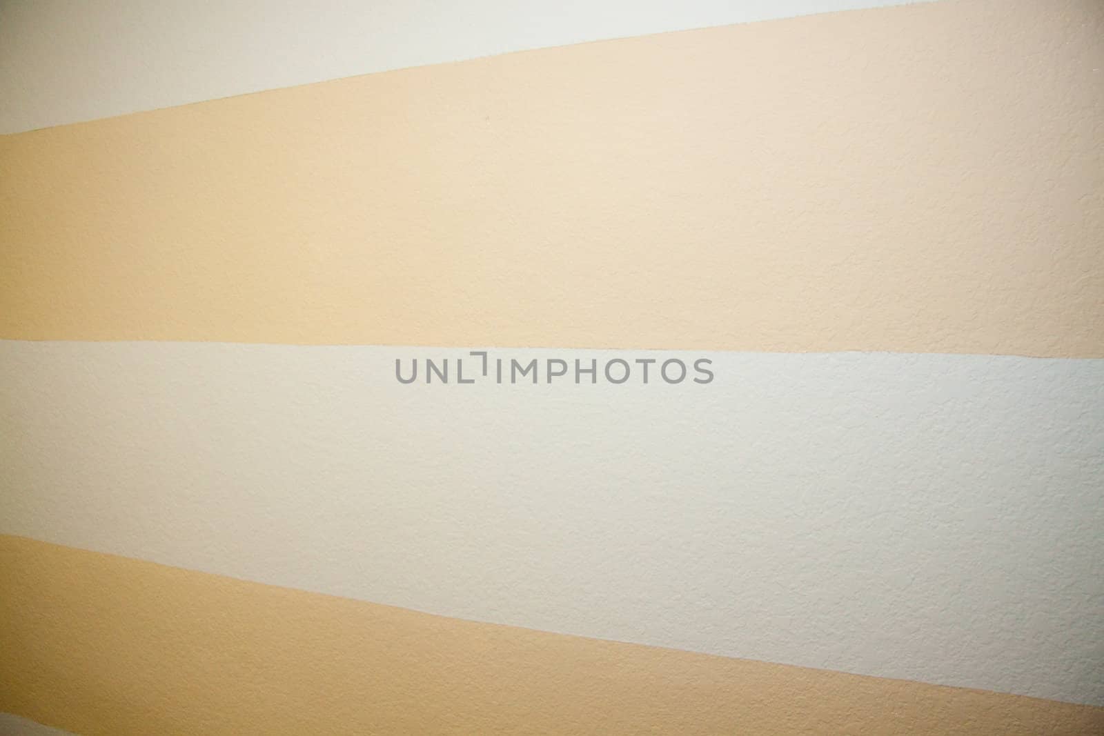 A striped wall gets smaller from right to left for a unique abstract texture background.
