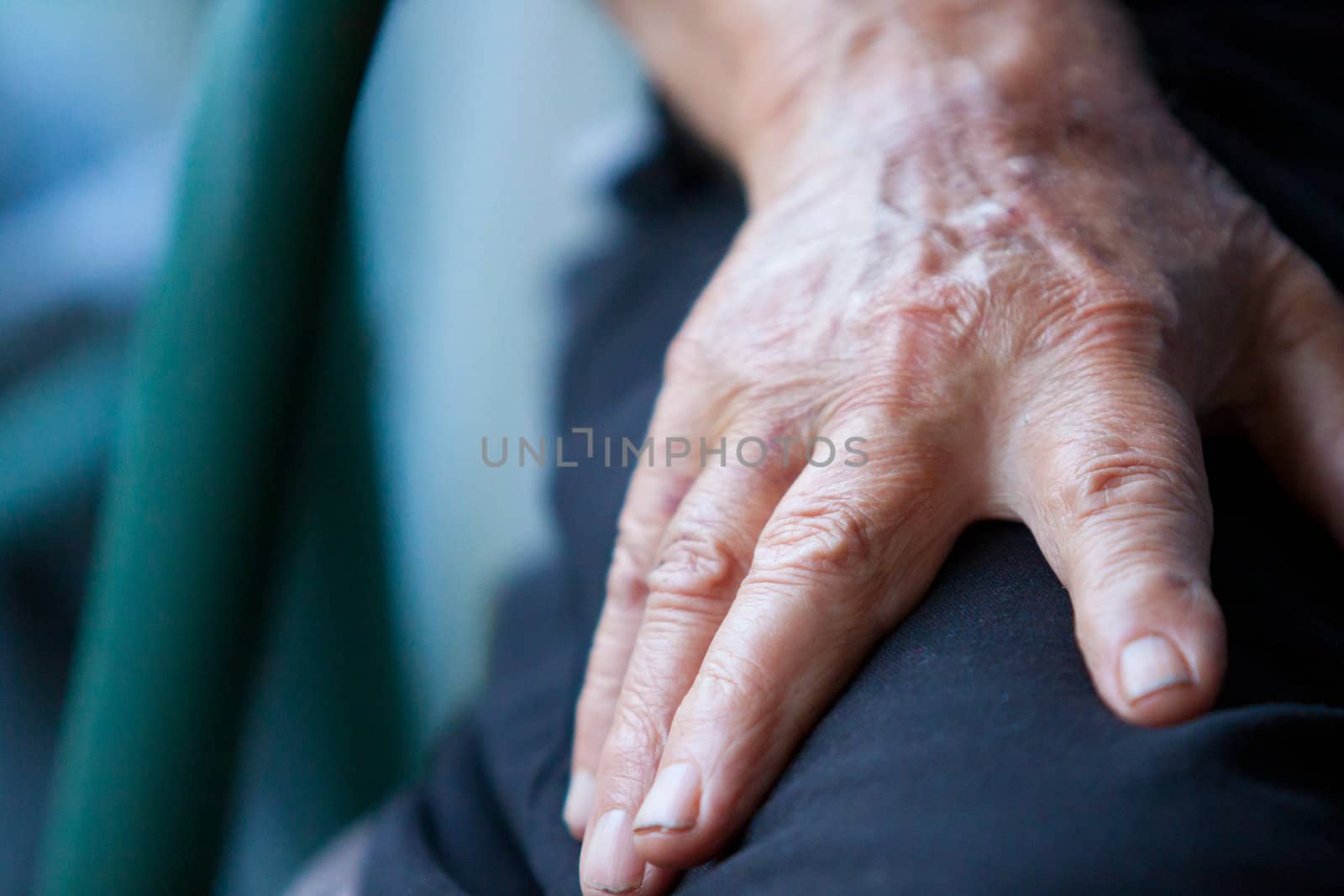 This old hand says a lot about the person it belongs to. Weathered, wrinkled, and elderly.