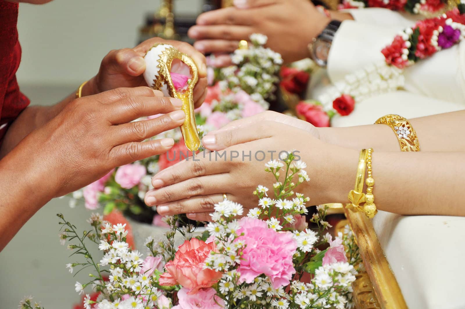 Blessed water at Thai wedding ceremony by bigjom