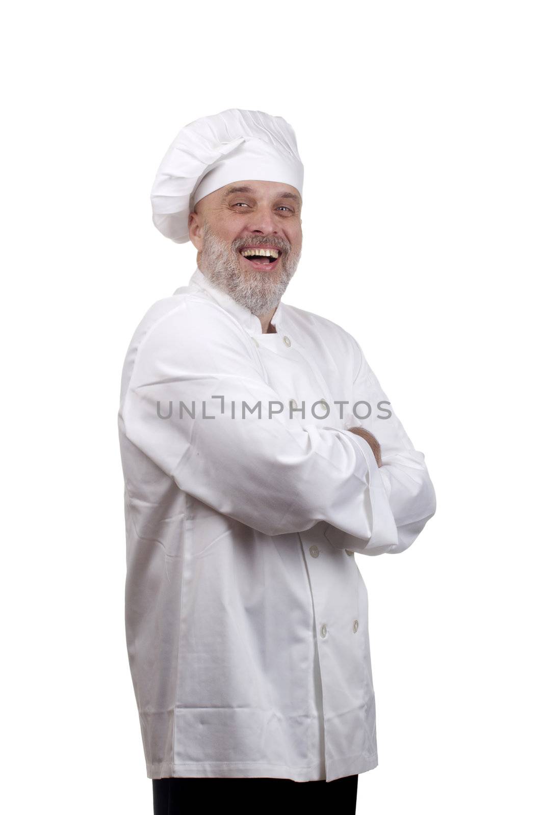 Portrait of a happy chef in a chef's hat and uniform isolated on a white background.