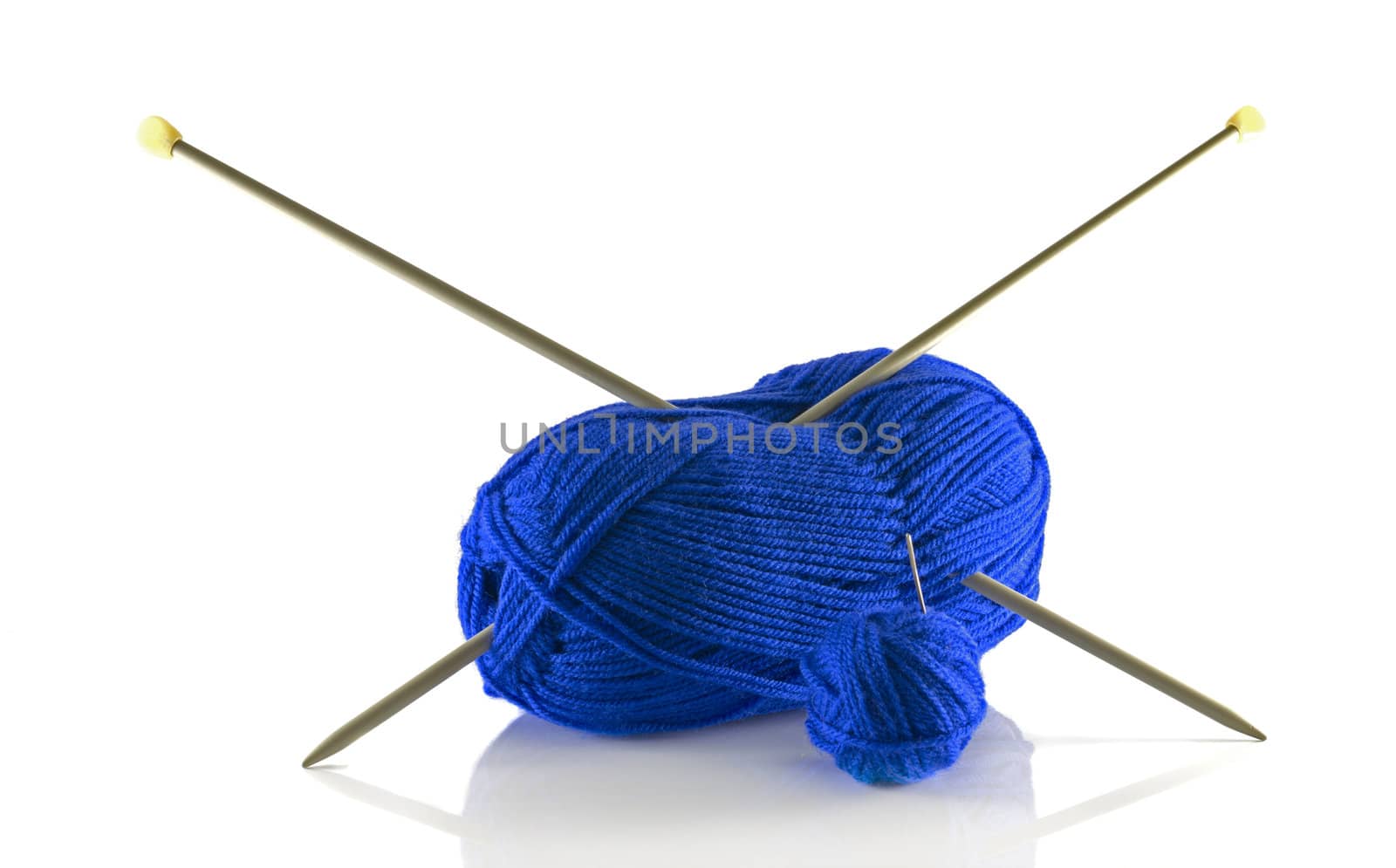 knitting needles and blue wool isolated on white