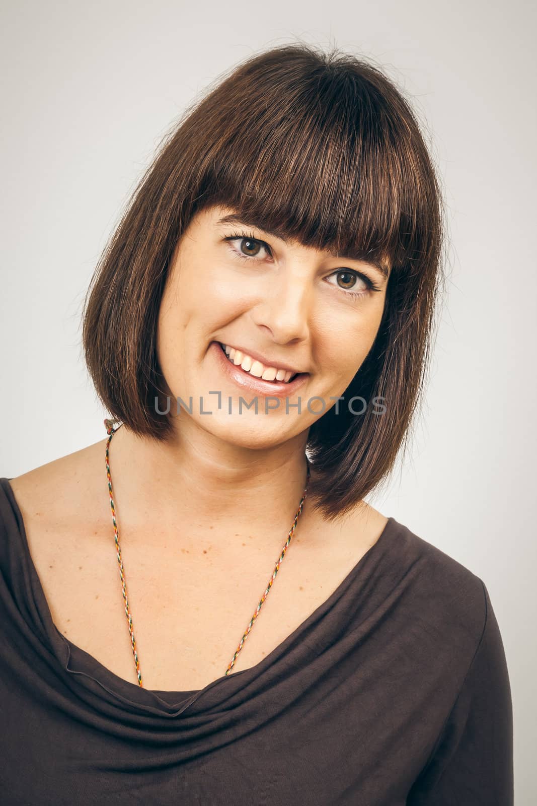 An image of a beautiful smiling woman