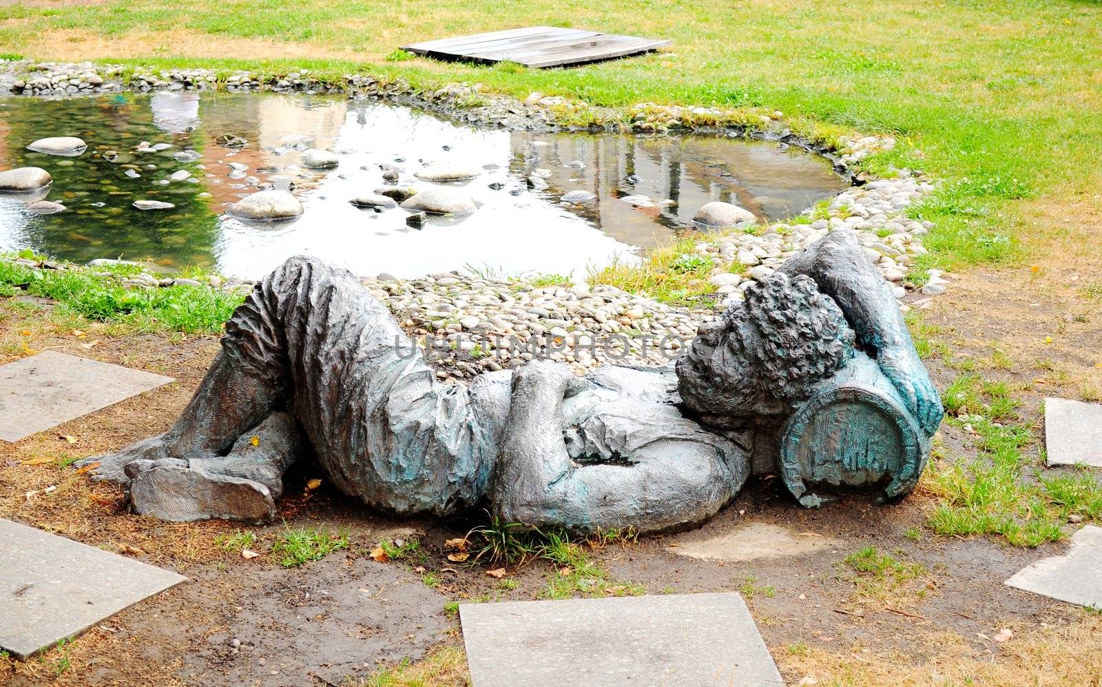 Sculpture of a man sleeping on a tun of wine in South Moravian town of Mikulov