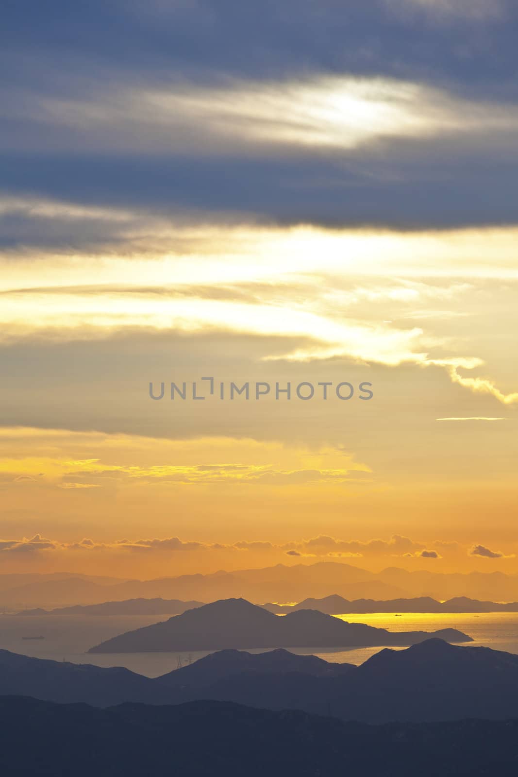 Sunset at sea and mountains in Hong Kong