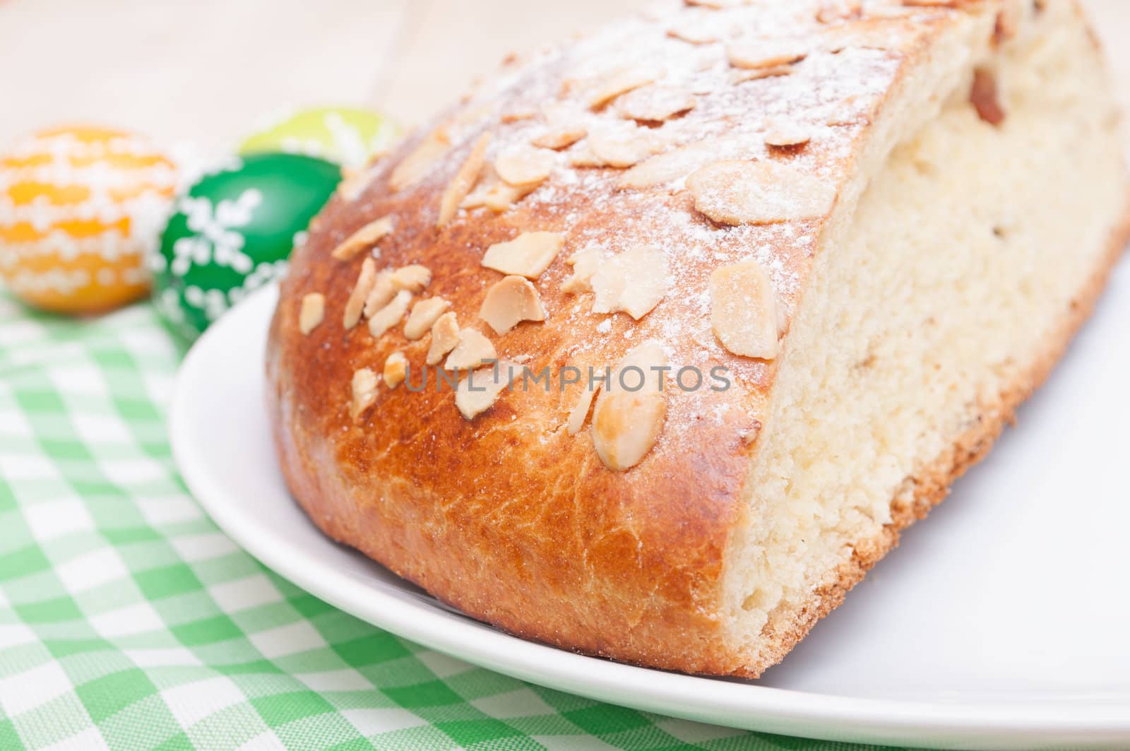 Typical Homemade Easter Cake With Almonds and Easter Eggs