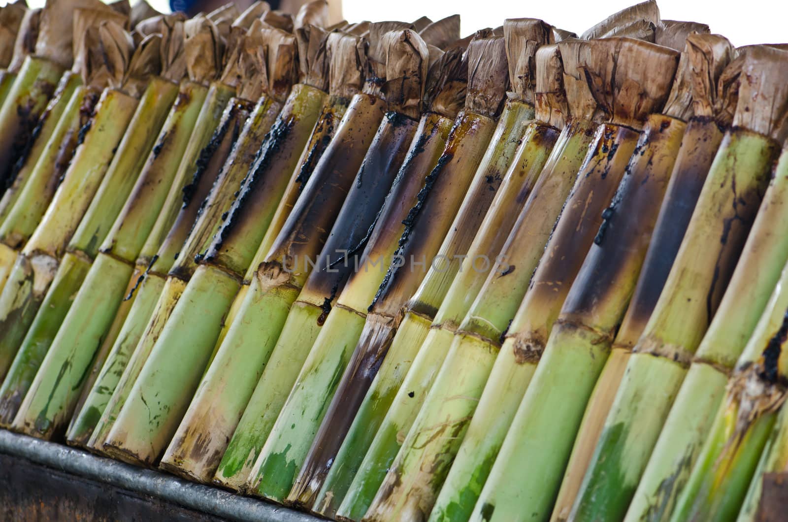 Glutinous rice roasted in bamboo joints, Thai food