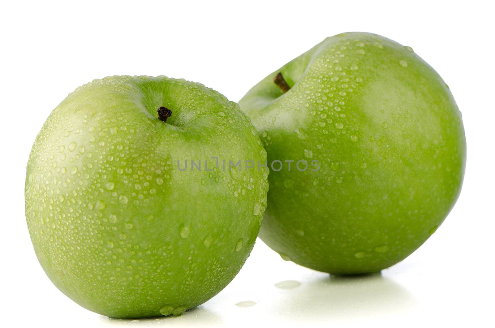 Two fresh green apples on white background.