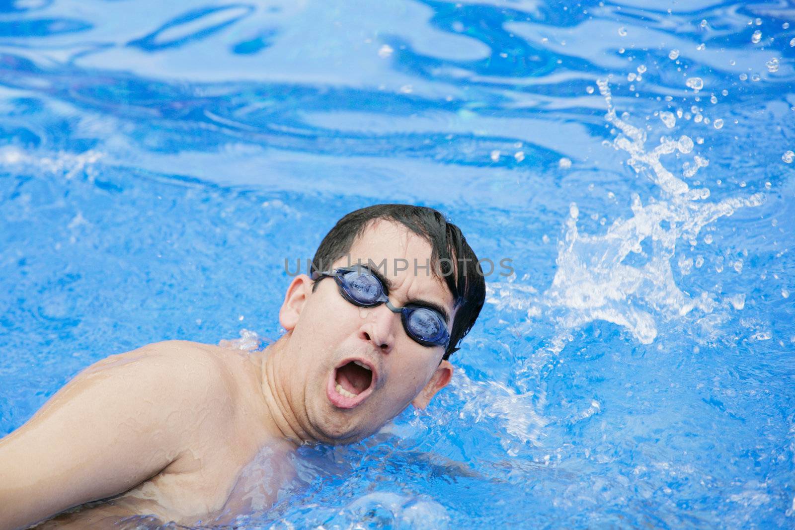 Swimmer breathing performing the crawl stroke by dacasdo