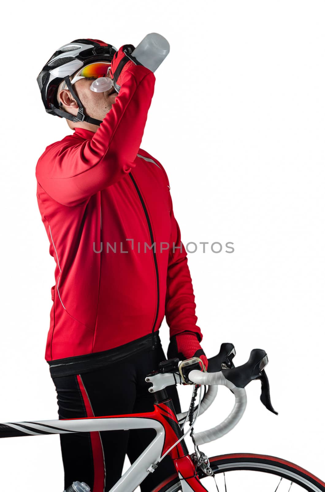 Cyclist drinking water isolated on white background.