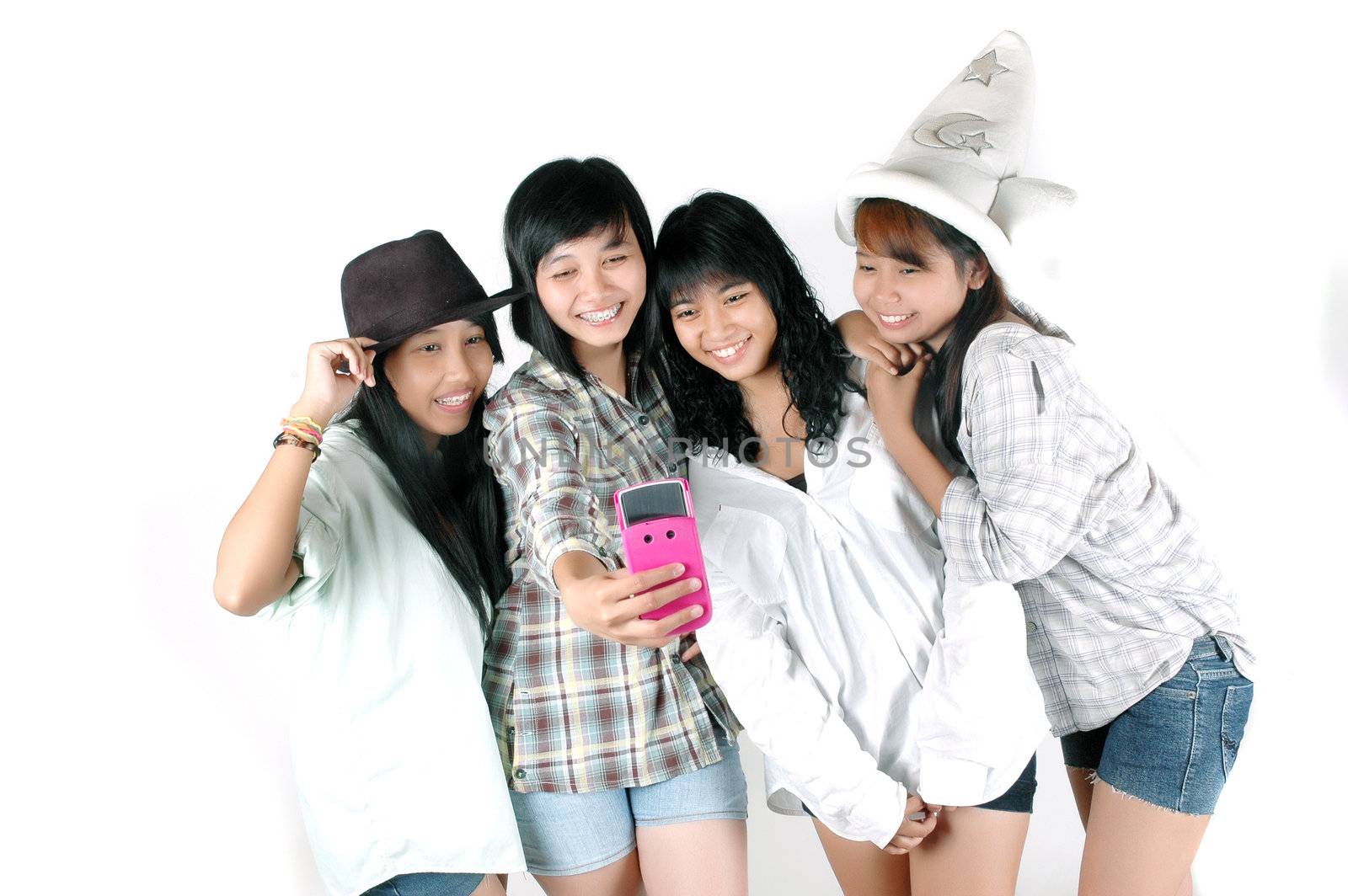 teenage girls take pictures  with camera phones by antonihalim