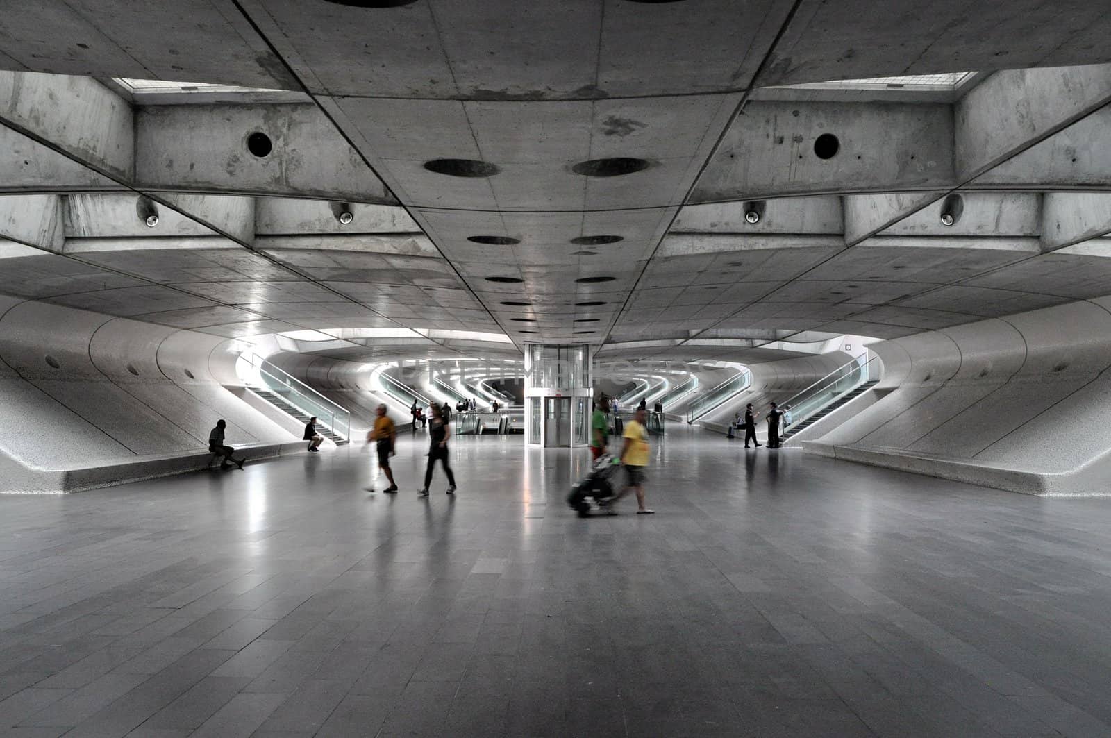 Travellers at a metro station by anderm