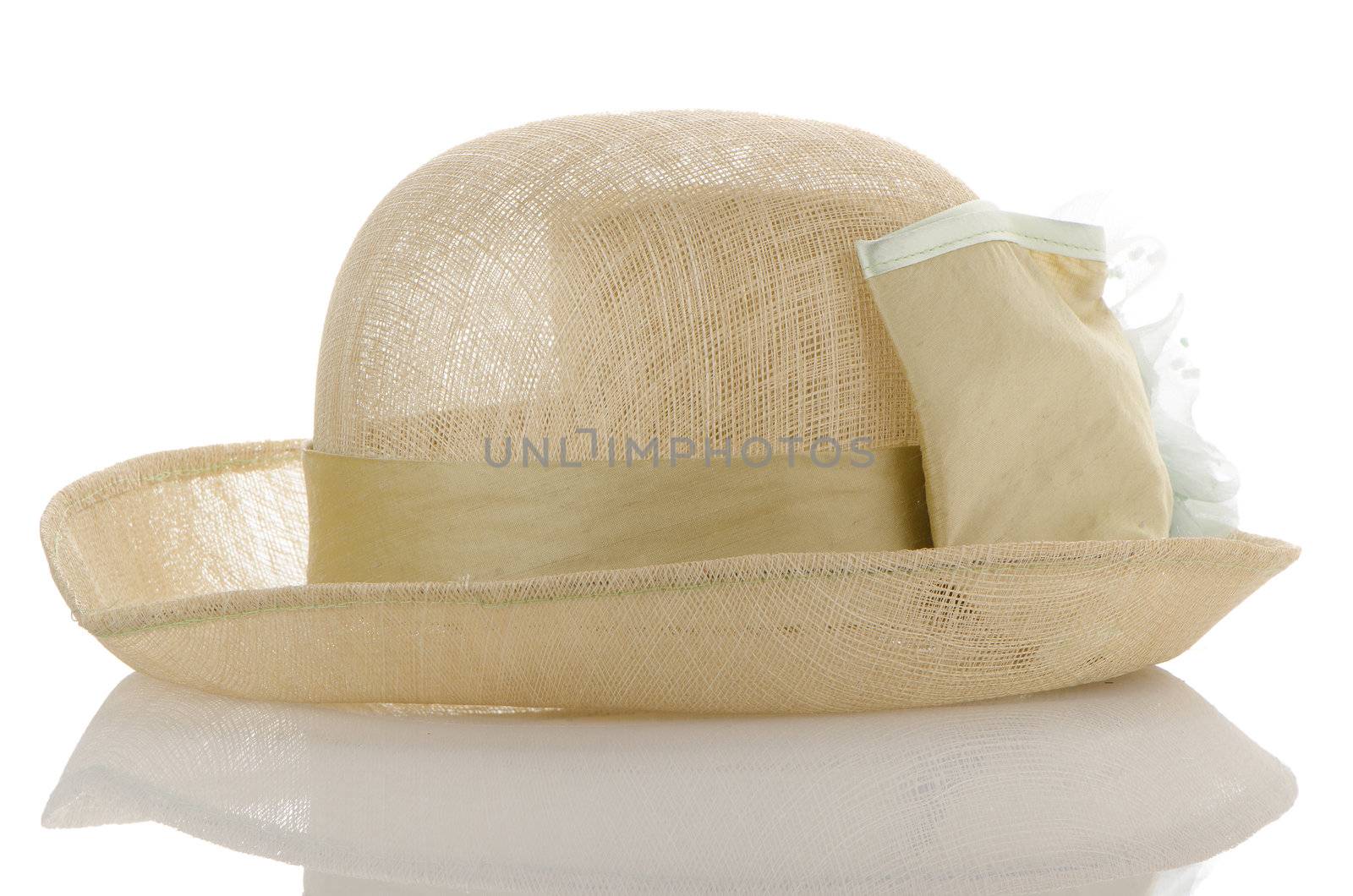 Fashion lady hat on white reflective background.