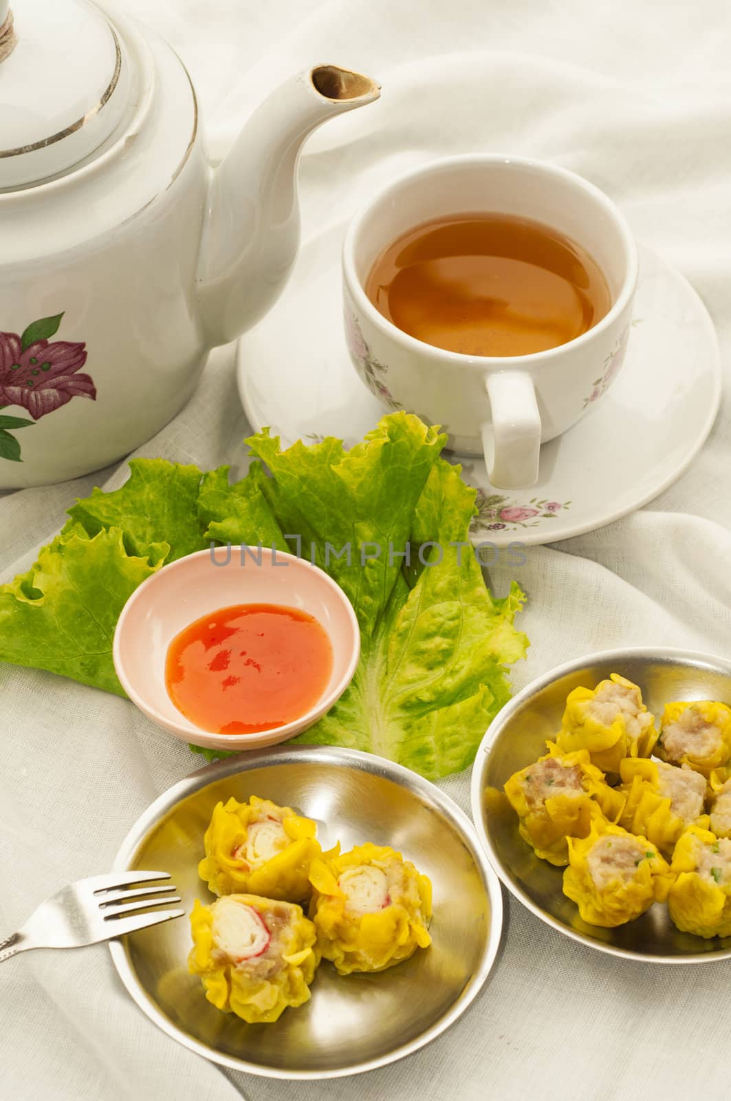 Dim sum with tea by TanawatPontchour