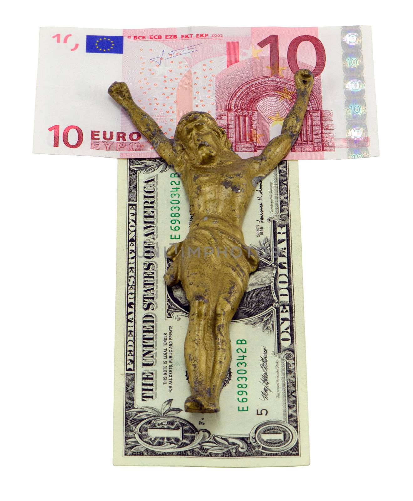 Gold jesus crucify on euro and dollar banknotes isolated on white. Concept of world finance crisis. Ten euro and one dollar banknotes.