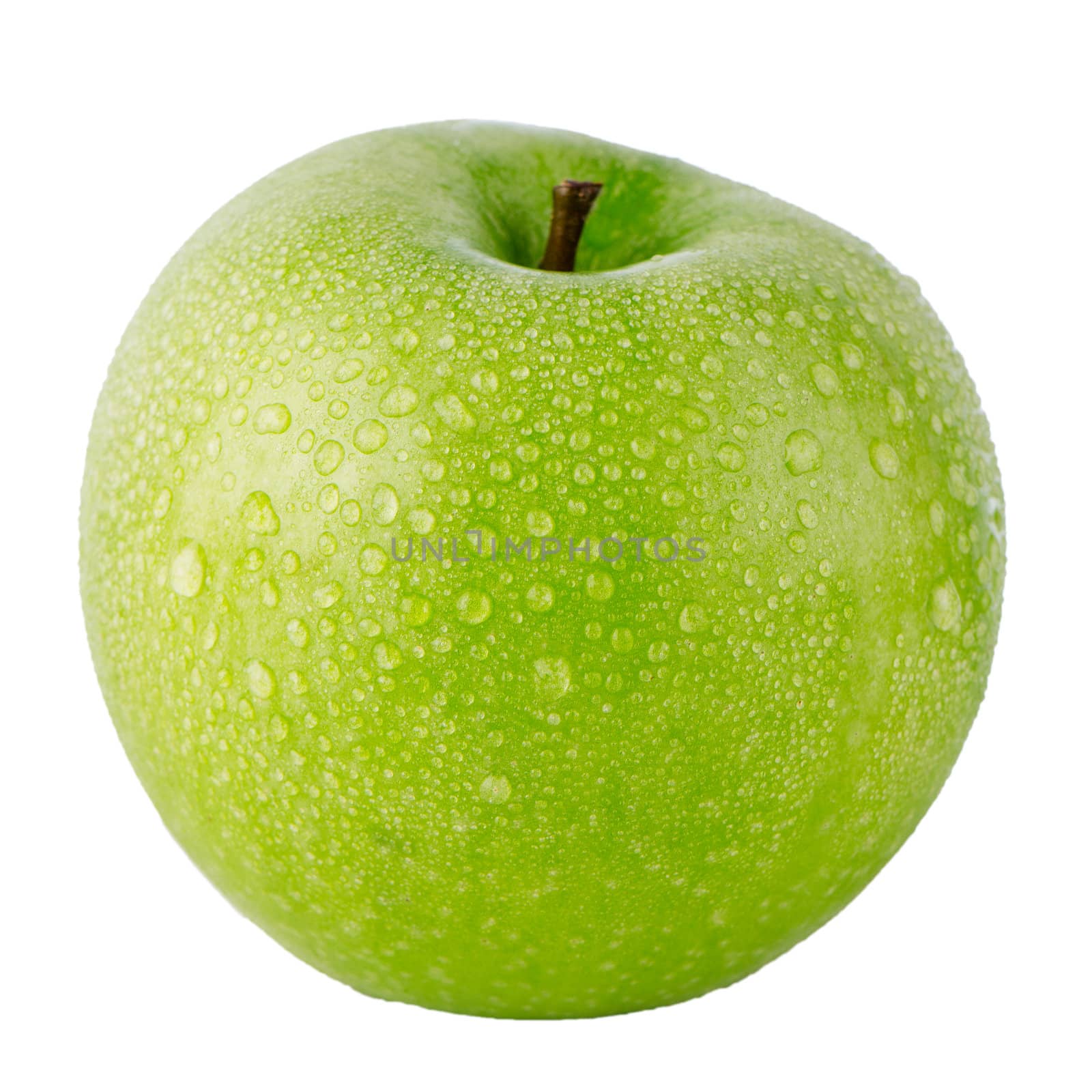 Closeup of green apple on white background.