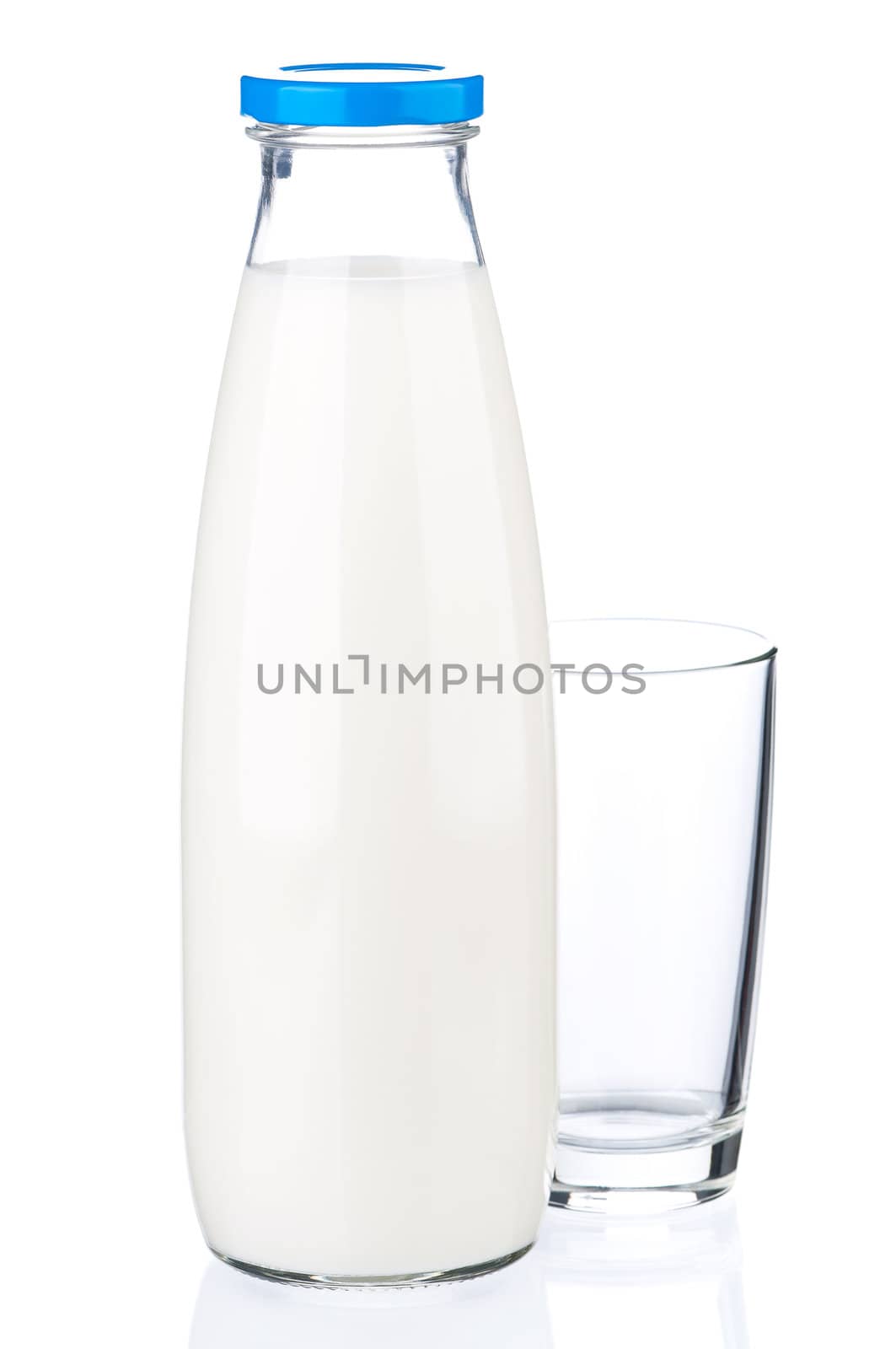 Bottle of milk and empty glass isolated on white background